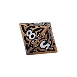 Bronze polyhedral dice with black engravings on a white background