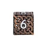 Decorative die with Celtic knot design and number 6 on a white background