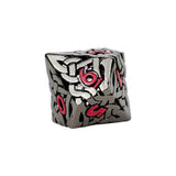 Metallic die with red numbers on a white background