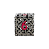 Metallic dice with Celtic knot design and red number 6 on a white background