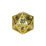 Gold metal D20 dice with black numbering on a white background