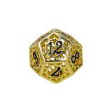 Gold metal dice with black numbers on a white background