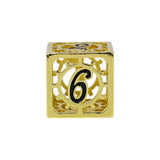 Gold cube with the number 6 on a white background