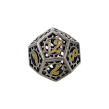 Metal polyhedral dice with gold numbers on a white background