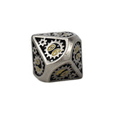 Metallic die with gear design and '06' on a white background