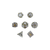 Set of silver and gold dice on a white background