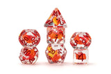Set of dice with red and clear design on a white background