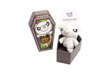 White plush toy with 'Spekter' branding in a brown box on a white background
