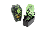 Glowing green skeleton teddy bear in a coffin-shaped box with 'Bones' branding.