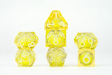 Set of yellow polyhedral dice on a white background