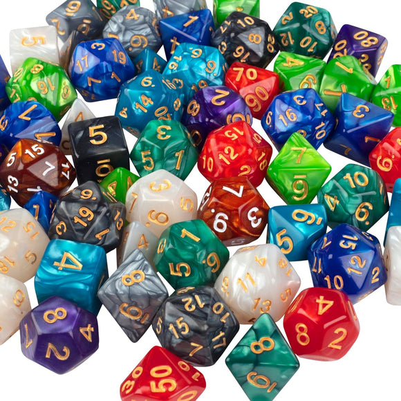Assorted multicolored polyhedral dice with numbers on a white background