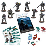 Halo Flashpoint game components including figures, rules book, and miniatures on a white background