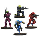 Four colorful action figure toys on a white background