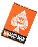Orange deck of playing cards with 'Mad Man' branding on a white background