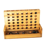 Wooden game board with holes and additional compartments on a white background