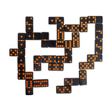 Set of black dominoes with orange dots arranged in a pattern on a white background