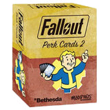 Box of 'Fallout Perk Cards 2' with Vault Boy holding cards on a white background