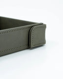 Gray leather tray on a white background