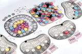 Board game components with colorful dice and gray boards on a white background