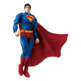 Superman action figure in a flying pose, wearing a blue bodysuit with a red cape and red and yellow belt, isolated on a white background.