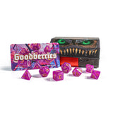 Set of purple dice with 'Goodberries' branding and a dice tray on a white background