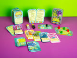 Collection of colorful cards and game pieces on a purple and green background