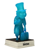 Blue figure with a top hat and suitcase on a white background