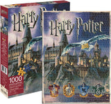 Harry Potter 1000-piece jigsaw puzzle box and assembled puzzle image showing Hogwarts castle at night with a flying owl and Gryffindor house crests.