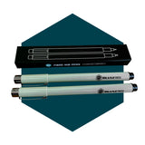 Three pens with a box on a teal background