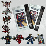 Collection of Warhammer figurines and packaging on a light gray background