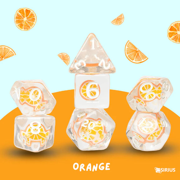 Transparent dice set with orange slices design on a colorful background, featuring the brand 'SIRIUS'.
