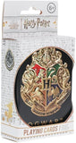 Harry Potter Hogwarts Playing Cards in its original retail packaging, featuring a prominent gold and black Hogwarts crest emblem on the front of the box.