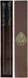 Harry Potter-themed wand with decorative box featuring Hogwarts crest