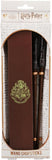 Packaged wand chopsticks with Hogwarts crest design on a white background
