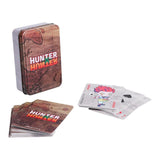 A boxed card game set labeled HUNTER HUNTER, shown with a metal tin, a stack of cards, and several individual cards on a plain white background.