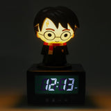 Harry Potter-themed night light with digital clock on a dark background