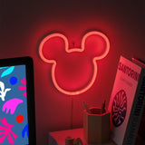 Neon sign shaped like a mouse ear on a dark background