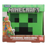 Minecraft-themed product packaging with a green face design and characters on a white background.