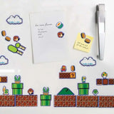 Super Mario-themed magnets on a white surface with a pen and paper.