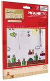 Super Mario Bros. Collector's Edition magnets set in its original red cardboard packaging, featuring a white magnetic board decorated with various colorful retro game-themed magnets.