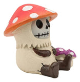 Skeleton figurine with a red mushroom hat on a white background