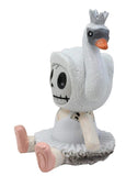 Plush toy of a skeleton goose with a tiara on a white background