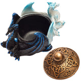 Decorative item with dragons and a bronze emblem on a white background