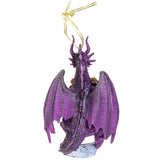 A purple dragon ornament with spread wings and a gold hanging ribbon, shown against a plain white background.