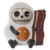 Skeleton character with an egg and bacon on a white background