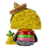 Figurine of a taco with a sombrero on a white background