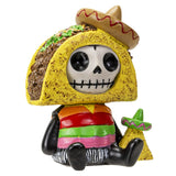 Skeleton figure in a taco costume with a sombrero on a white background