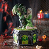 Statue of a woman with a dragon on a dark background