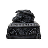 Decorative black box with a dragon design on a white background