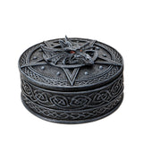Decorative black box with dragon design and Celtic patterns on a white background